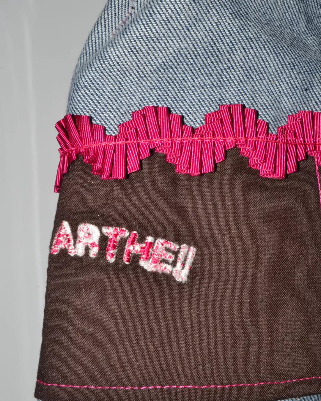 BOLSO DE MANO NUDO DENIM